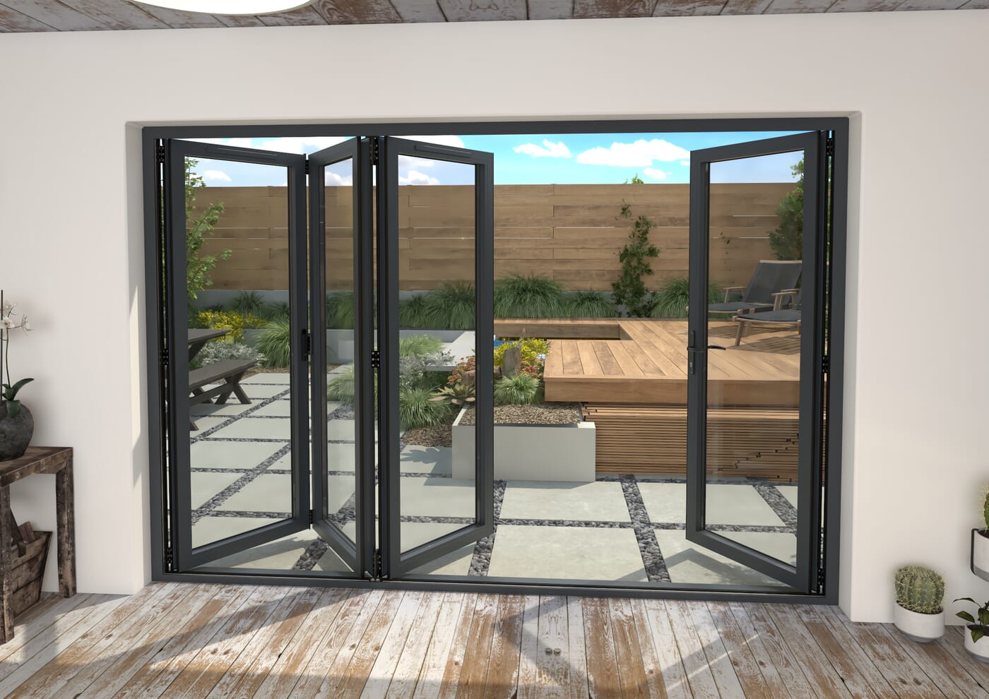 Anthracite grey aluminium bifold doors open onto a garden