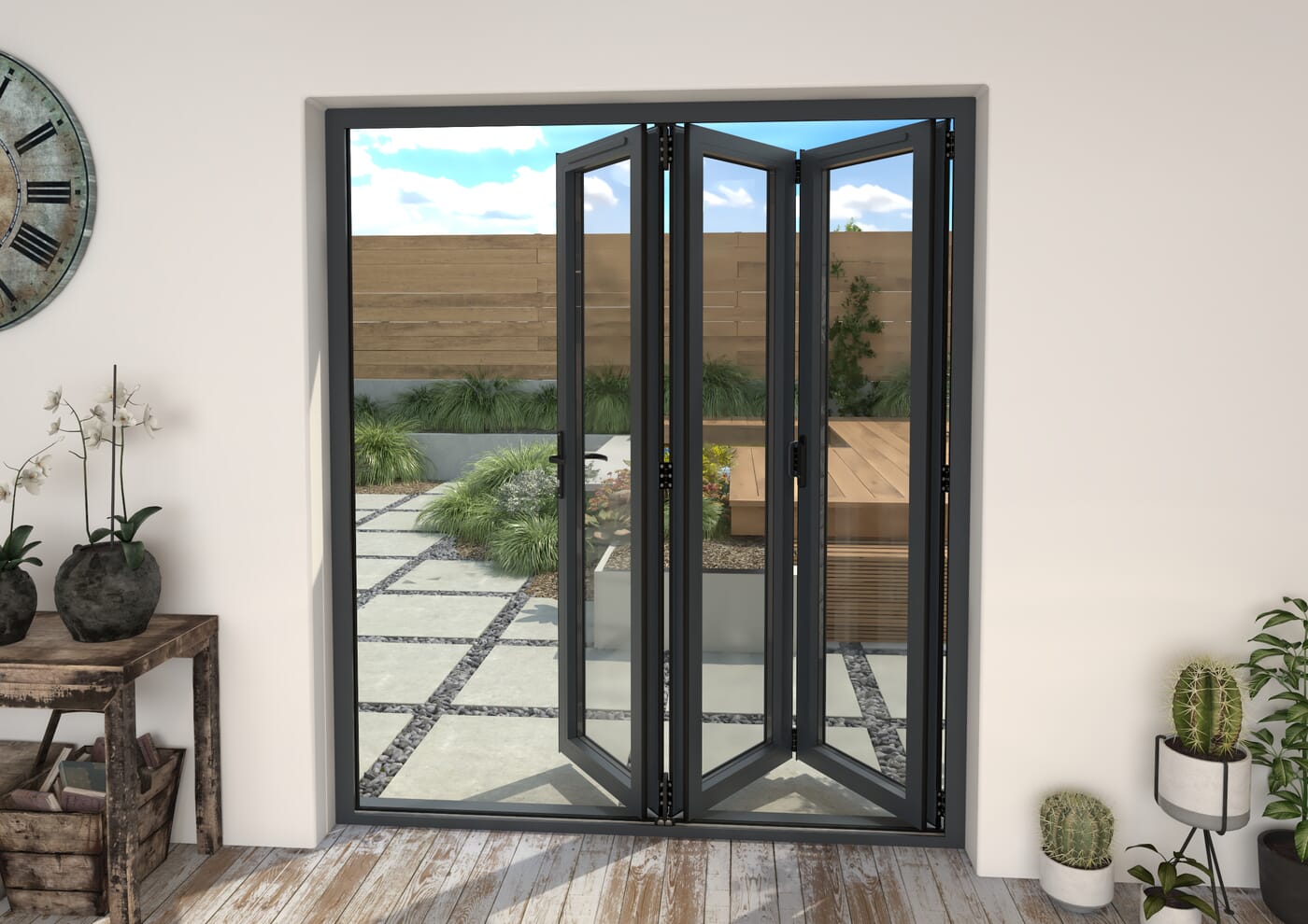 Interior view of the bifold doors partially folded, looking out onto a paved garden